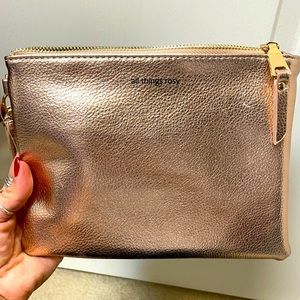 NWOT Altar’d State Rose Gold Clutch.